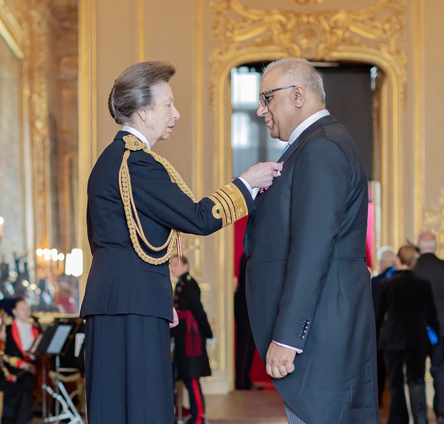 Safaraz Ali MBE being invested with his MBE by HRH The Princess Royal at Windsor Castle